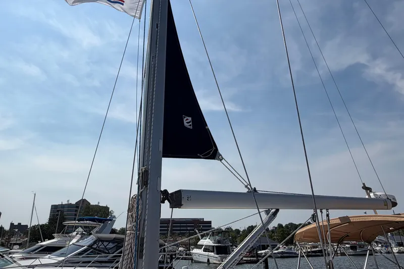 Slide: The Image of Sailboat mast and sail of a 2006 Beneteau 423 docked at a marina. - 21
