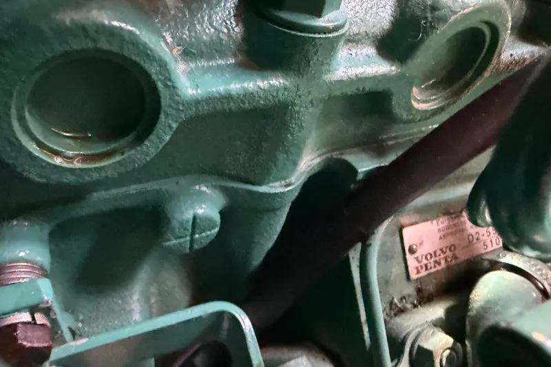 Slide: The Image of Close-up of a Volvo Penta engine component in a 2006 Beneteau 423 sailboat. - 56