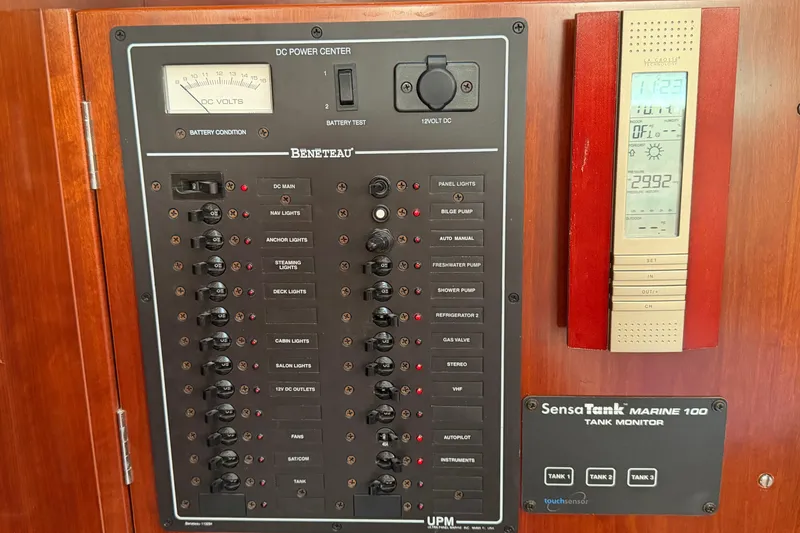 Slide: The Image of Electrical panel and tank monitor on a 2006 Beneteau 423 sailboat. - 28