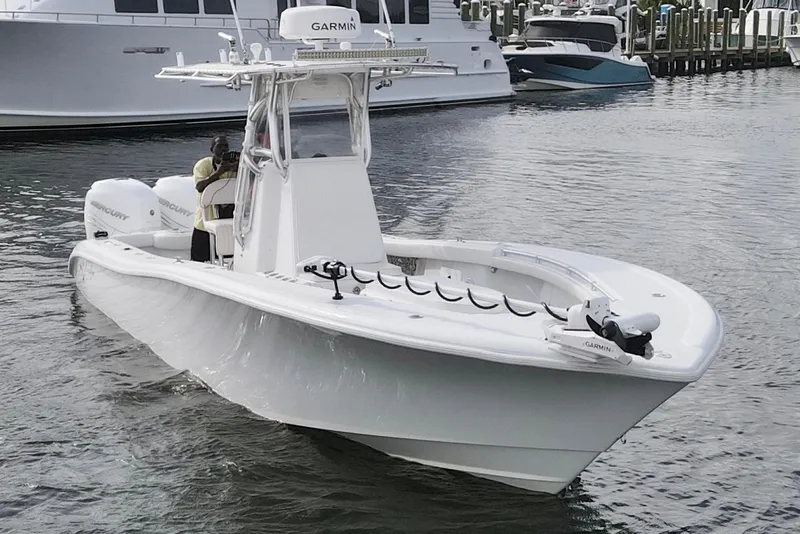 Slide: The Image of 2009 Yellowfin 29 Offshore boat with Garmin equipment, docked in a marina. - 3
