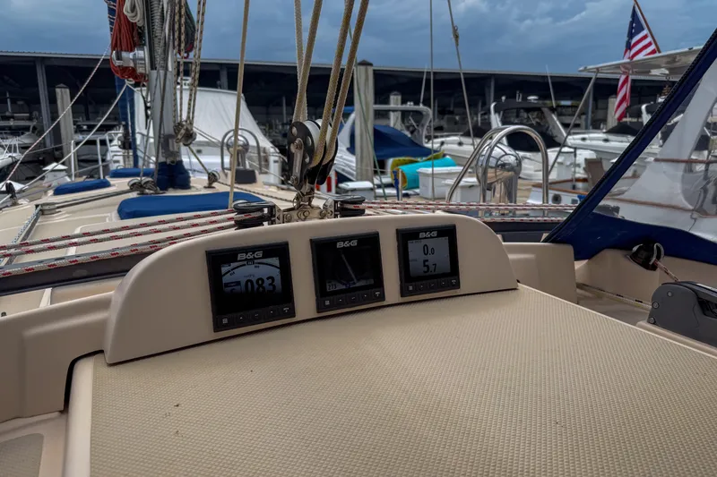 Slide: The Image of Cockpit view of 2004 Island Packet 370 sailboat with navigation instruments at marina. - 25