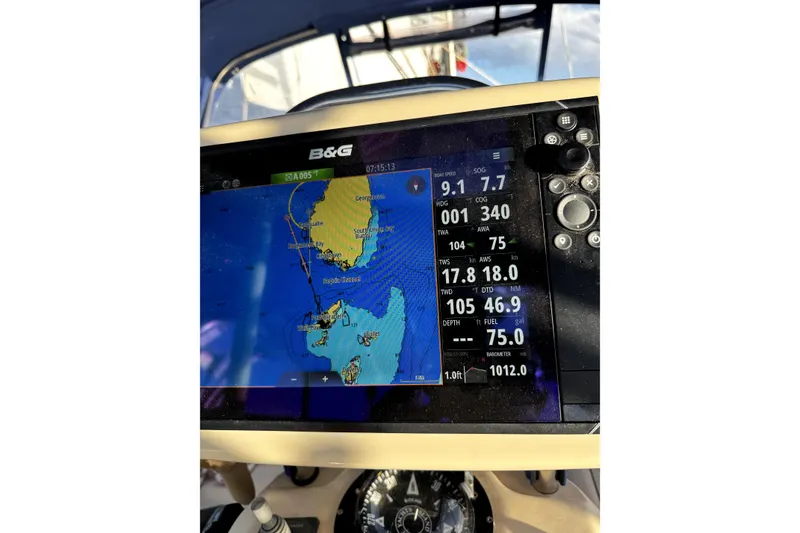 Slide: The Image of Navigation display on a 2004 Island Packet 370 sailboat, showing route and sailing data. - 37