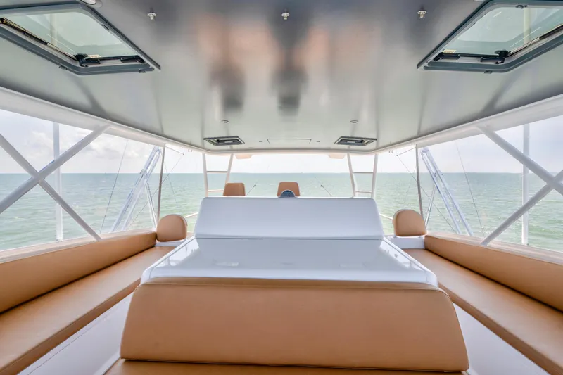 Slide: The Image of Interior view of 2006 Viking 68 Convertible yacht with ocean backdrop. - 11