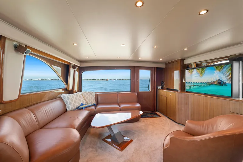 Slide: The Image of Luxurious interior of 2006 Viking 68 Convertible yacht with leather seating and ocean view. - 24