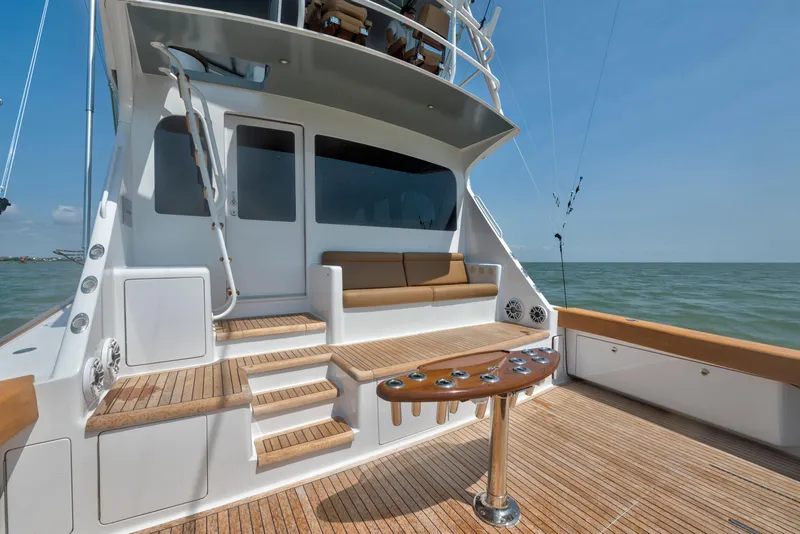Slide: The Image of 2006 Viking 68 Convertible yacht deck with seating and ocean view. - 17