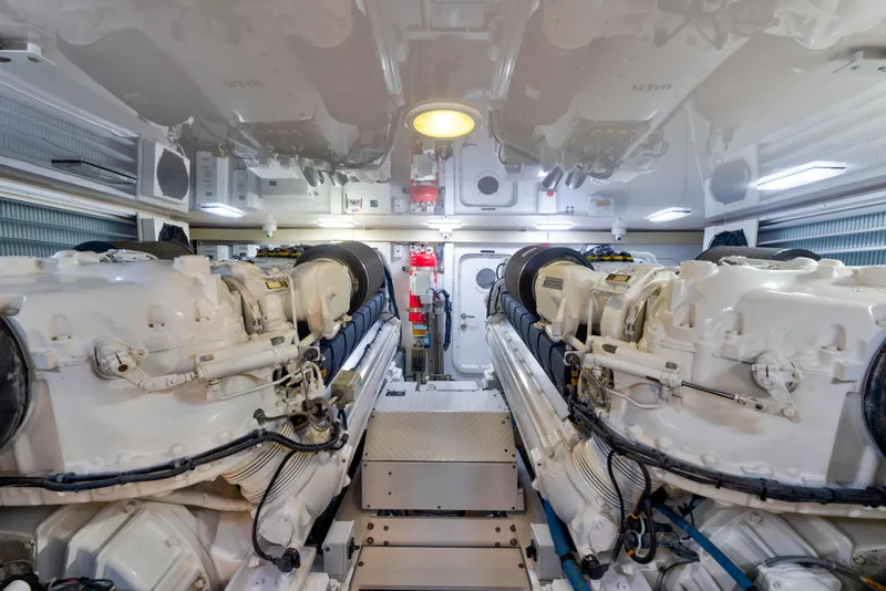 Slide: The Image of Engine room of a 2006 Viking 68 Convertible yacht, showcasing dual engines. - 46