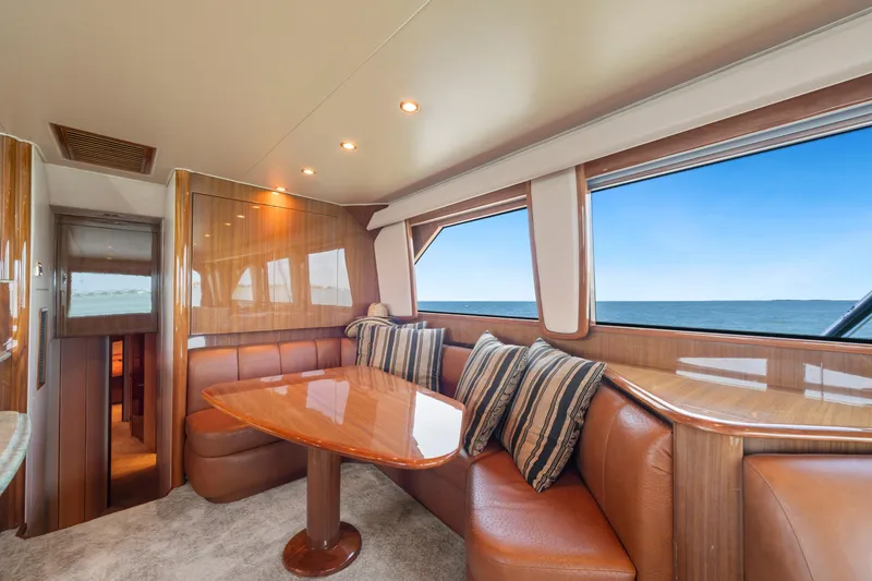 Slide: The Image of Luxurious interior of 2006 Viking 68 Convertible yacht with ocean view and plush seating. - 26