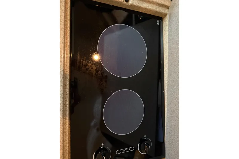 Slide: The Image of Ceramic cooktop on 1999 Sea Ray 380 Sundancer yacht kitchen. - 17