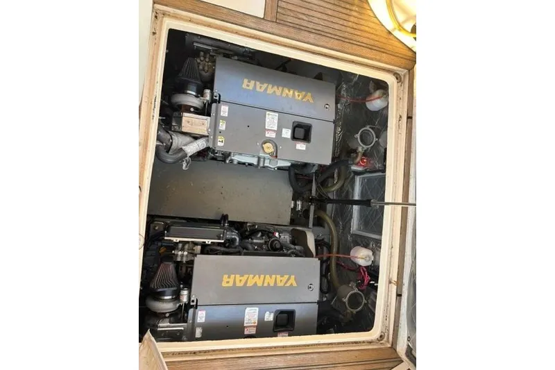 Slide: The Image of Engine compartment of a 2001 Apreamare 9 M boat with Yanmar engines. - 26