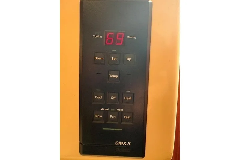 Slide: The Image of SMX II control panel displaying temperature settings on a 2001 Apreamare 9 M yacht. - 21