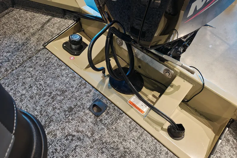 Slide: The Image of 2026 Tracker Pro Team 175 boat interior with motor cables and textured flooring. - 10