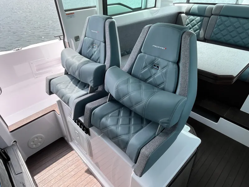 Slide: The Image of Axopar 37 XC Cross Cabin 2024: Luxurious seats with quilted leather and modern design. - 11