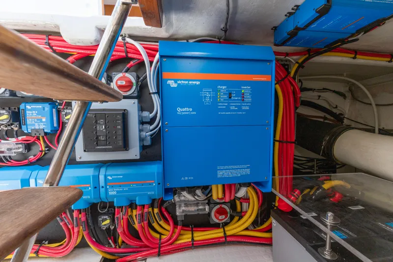 Slide: The Image of Electrical system setup in a 2006 North Pacific 52 yacht, featuring Victron Energy components. - 52