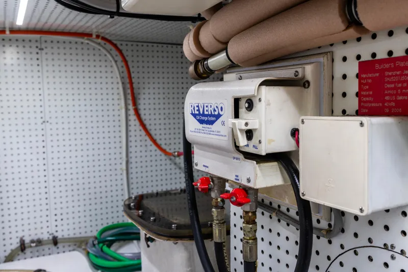 Slide: The Image of Engine room of 2006 North Pacific 52 yacht with Reverso oil change system. - 14