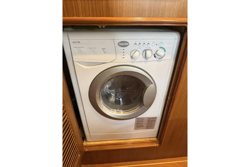 Slide: The Image of Splendide washing machine installed in a 2006 North Pacific 52 yacht. - 61
