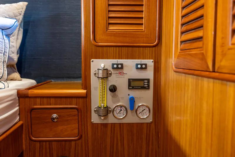 Slide: The Image of Control panel on a 2006 North Pacific 52 yacht with wooden interior. - 5
