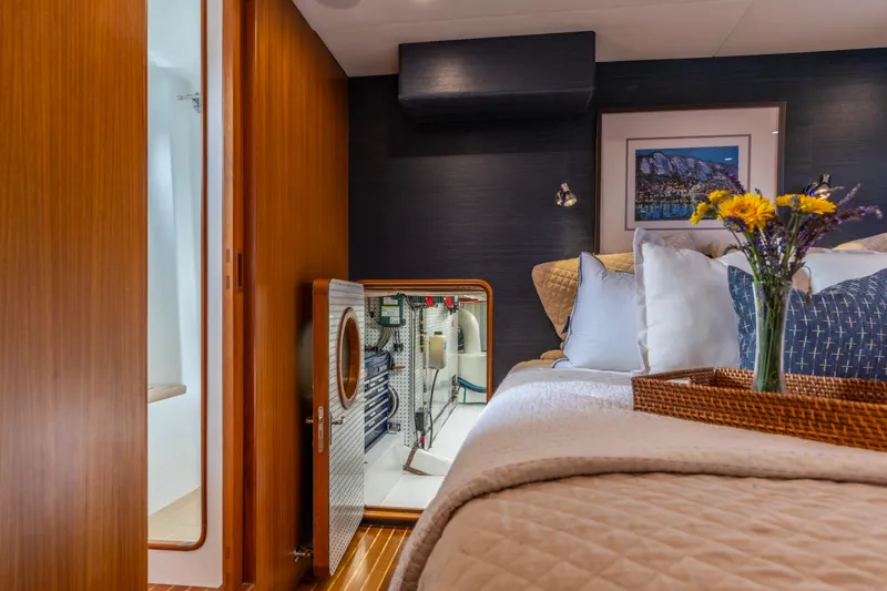 Slide: The Image of Luxurious cabin interior of a 2006 North Pacific 52 yacht with elegant decor and flowers. - 9