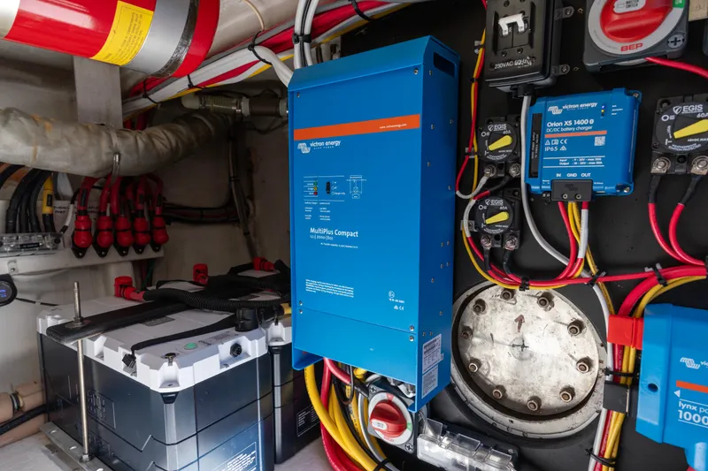 Slide: The Image of Electrical system setup in a 2006 North Pacific 52 boat, featuring Victron Energy components. - 50