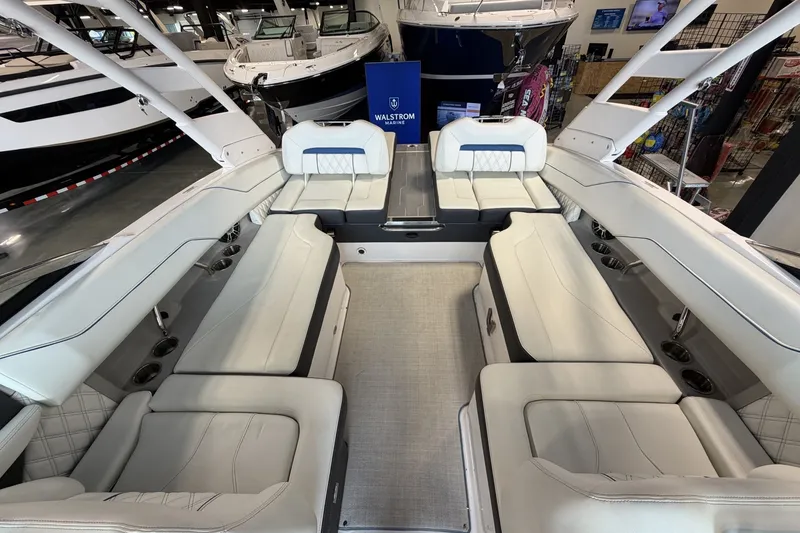 Slide: The Image of Luxurious interior of 2021 Regal LS4 Surf boat with spacious seating and elegant design. - 14
