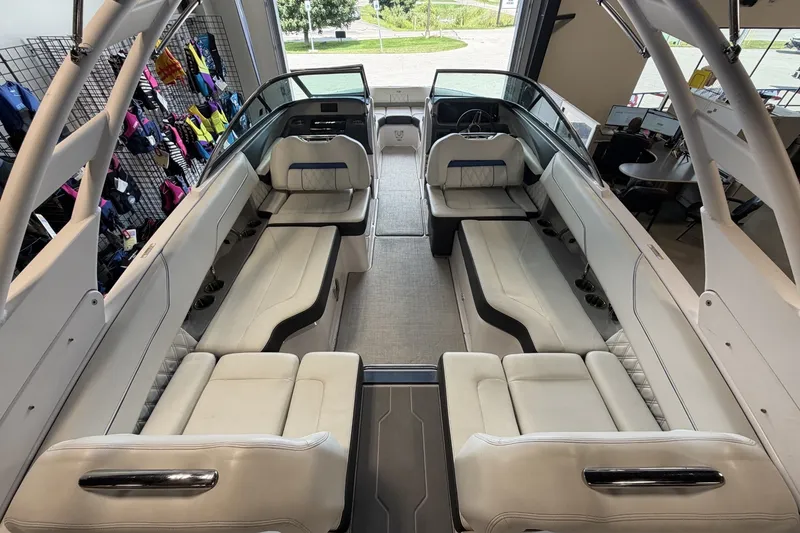 Slide: The Image of 2021 Regal LS4 Surf boat interior with spacious seating and modern design. - 10