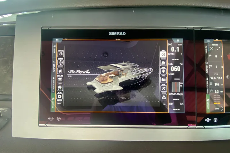 Slide: The Image of Simrad display showing 2019 Sea Ray SLX 400 boat controls and navigation data. - 28