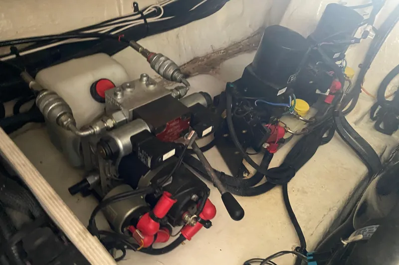 Slide: The Image of Engine compartment of a 2019 Sea Ray SLX 400 boat, showcasing mechanical components. - 45