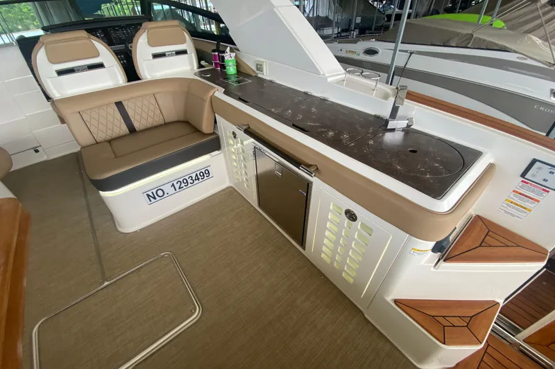 Slide: The Image of Luxurious interior of 2019 Sea Ray SLX 400 yacht with seating and kitchenette. - 18