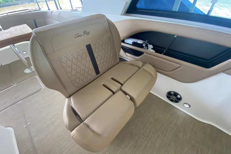 Slide: The Image of Luxurious tan seating on 2019 Sea Ray SLX 400 boat interior. - 22