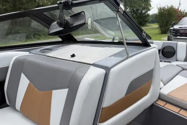 Slide: The Image of 2022 Malibu Wakesetter 23 MXZ interior with stylish seating and modern design. - 28