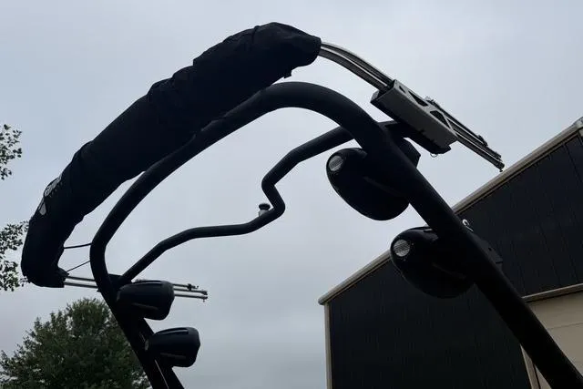 Slide: The Image of 2022 Malibu Wakesetter 23 MXZ wakeboard tower against cloudy sky. - 21
