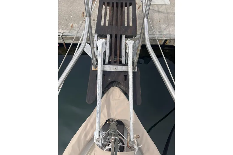 Slide: The Image of Bow of 1977 Alajuela 38 MKI sailboat with dock and water view. - 52