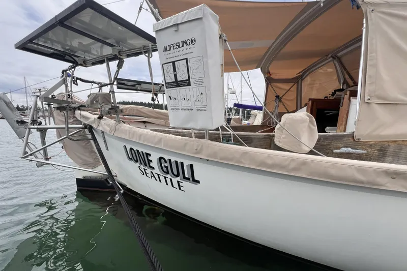 Slide: The Image of 1977 Alajuela 38 MKI sailboat "Lone Gull" docked in Seattle marina. - 18
