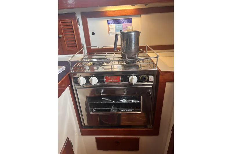 Slide: The Image of Stainless steel stove and oven in a 1977 Alajuela 38 MKI yacht kitchen. - 40