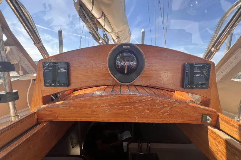 Slide: The Image of Cockpit of 1977 Alajuela 38 MKI sailboat with wooden finish and navigation instruments. - 15