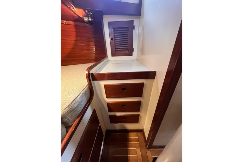 Slide: The Image of 1977 Alajuela 38 MKI interior with wooden drawers and cabinet. - 49