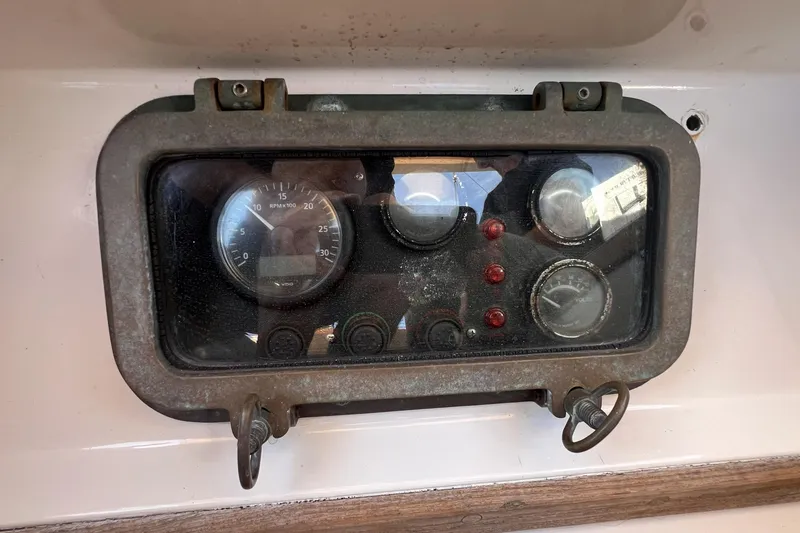Slide: The Image of Vintage Alajuela 38 MKI 1977 boat dashboard with gauges and indicators. - 32