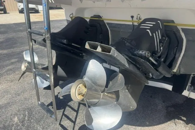 Slide: The Image of 2004 Monterey 298SS Super Sport boat propellers and ladder detail. - 3
