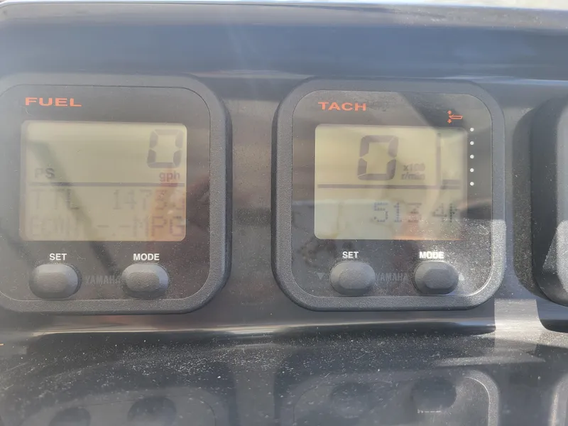 Slide: The Image of Digital gauges on a 2016 Jeanneau Merry Fisher 855 boat dashboard. - 30