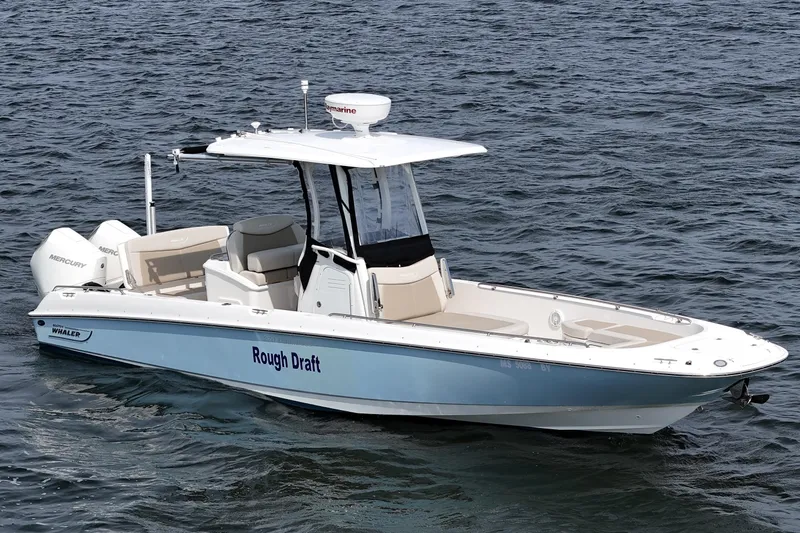 Slide: The Image of 2021 Boston Whaler 270 Dauntless boat on water, featuring sleek design and modern amenities. - 6