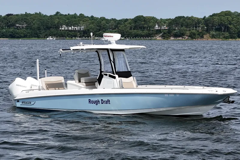 Slide: The Image of 2021 Boston Whaler 270 Dauntless boat on water, featuring sleek design and modern amenities. - 7