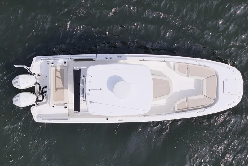 Slide: The Image of Overhead view of 2021 Boston Whaler 270 Dauntless boat on water. - 9