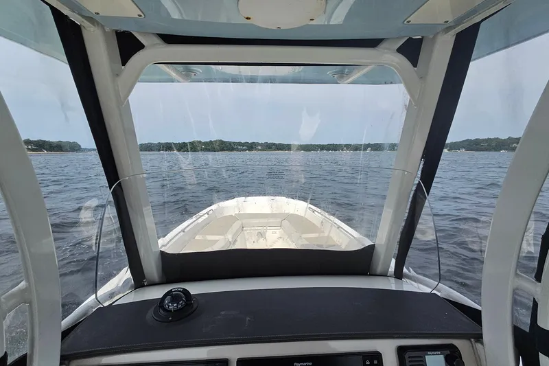 Slide: The Image of Interior view from a 2021 Boston Whaler 270 Dauntless boat on open water. - 20