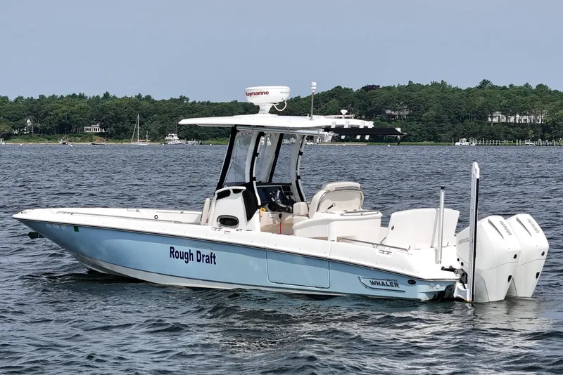 Slide: The Image of 2021 Boston Whaler 270 Dauntless boat on water, labeled "Rough Draft." - 3