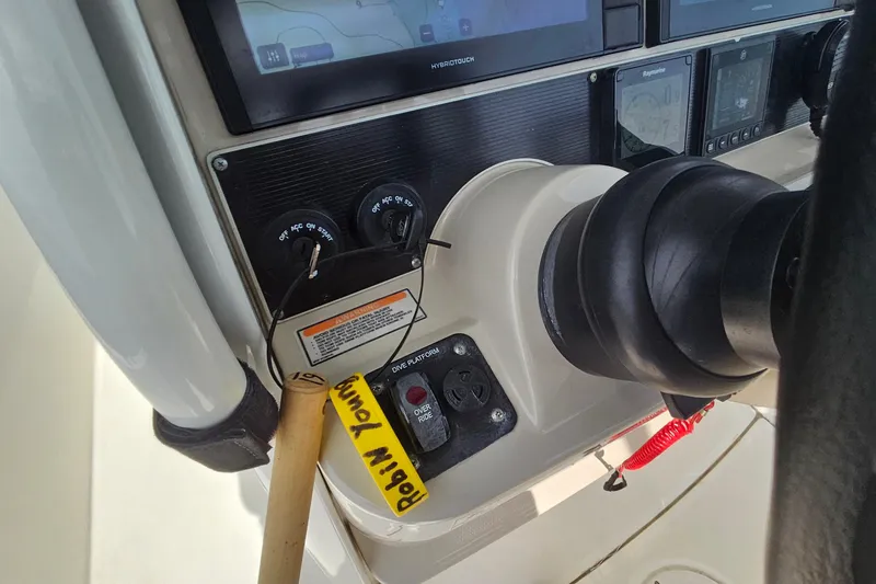 Slide: The Image of Control panel of a 2021 Boston Whaler 270 Dauntless boat with navigation equipment. - 19
