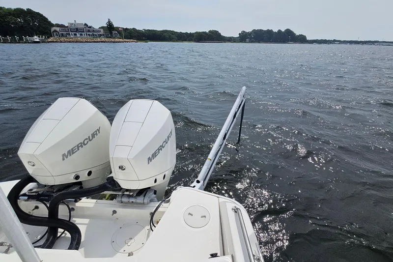 Slide: The Image of Boston Whaler 270 Dauntless 2021 with dual Mercury engines on open water. - 27