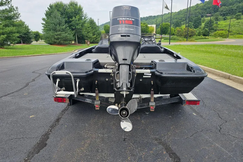 Slide: The Image of Rear view of a 1994 Nitro 180 FS boat with Tracker 115 engine on trailer. - 3