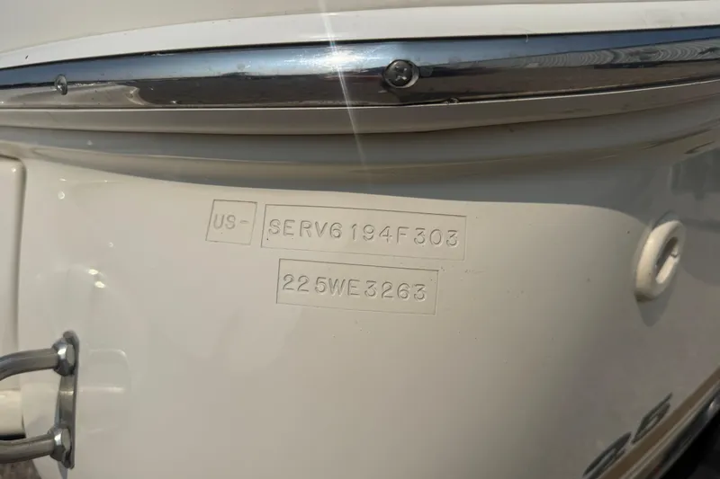 Slide: The Image of 2003 Sea Ray 225 Weekender boat hull identification number close-up. - 3