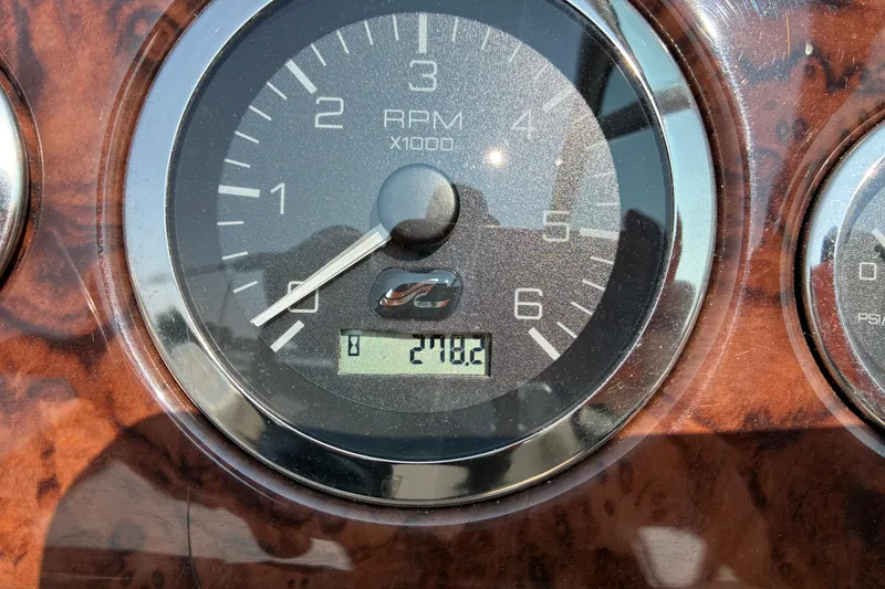 Slide: The Image of Close-up of 2003 Sea Ray 225 Weekender tachometer displaying 210.2 hours. - 25