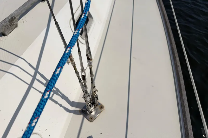 Slide: The Image of Close-up of rigging on a 1986 Pearson 33 sailboat deck. - 34