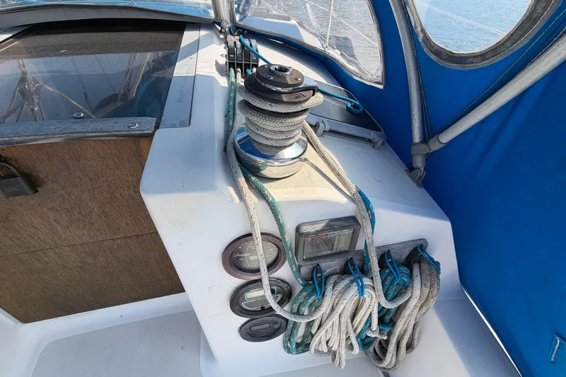 Slide: The Image of Sailboat cockpit with winch and ropes, Pearson 33, 1986 model. - 25